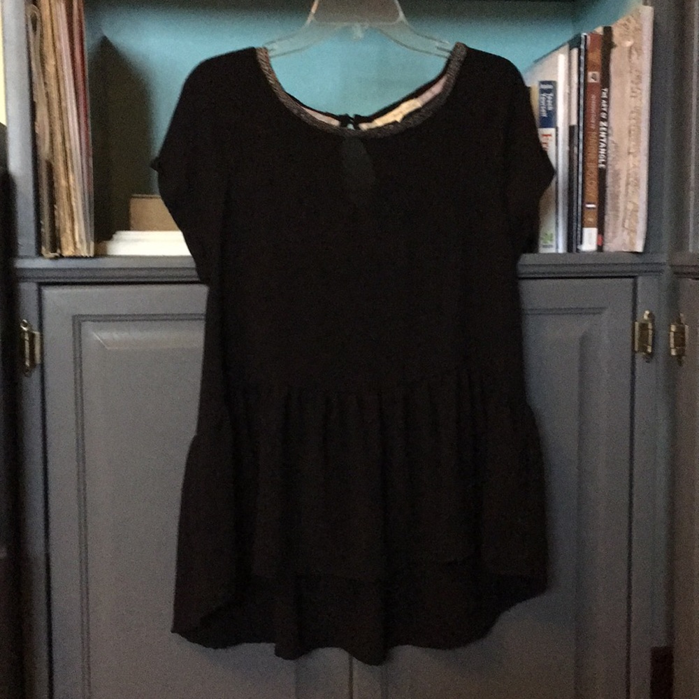 Black peplum tee light fabric